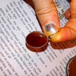 Tiny sterling and carnelian pendant